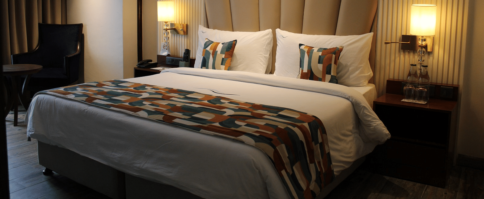 A bedroom featuring a functional working space for productivity at BluSalzz Residence, Amritsar